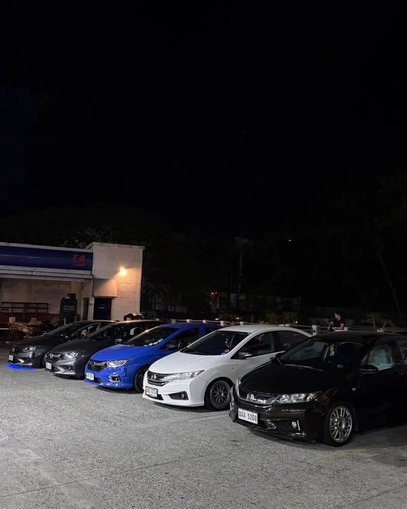 Line-up of Honda Citys at a night meet